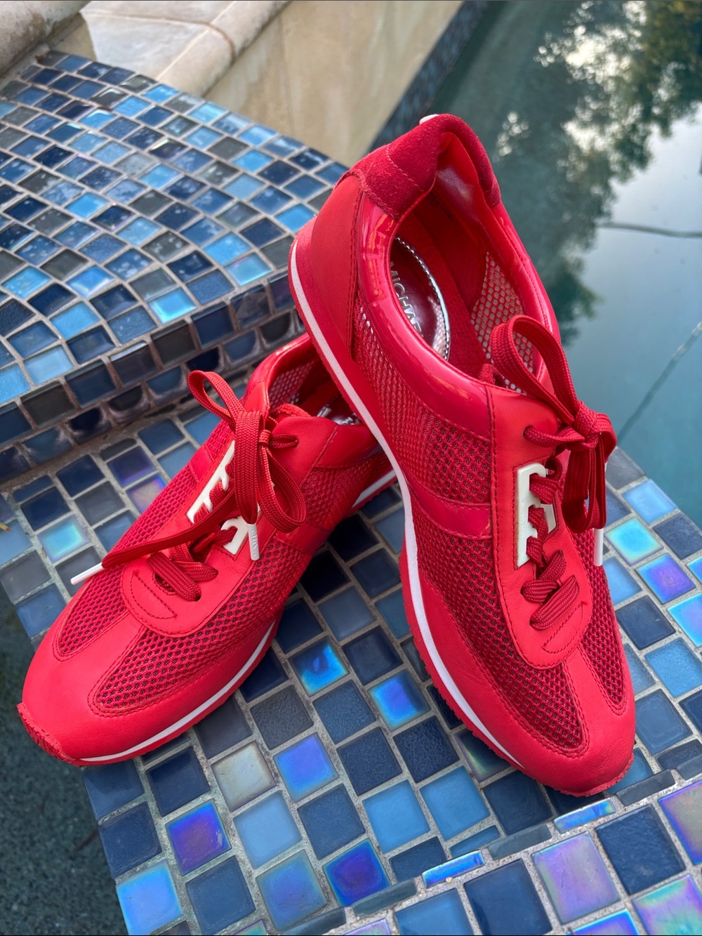 Michael Kors size 10 coral red Maggie coral red mesh leather sneakers